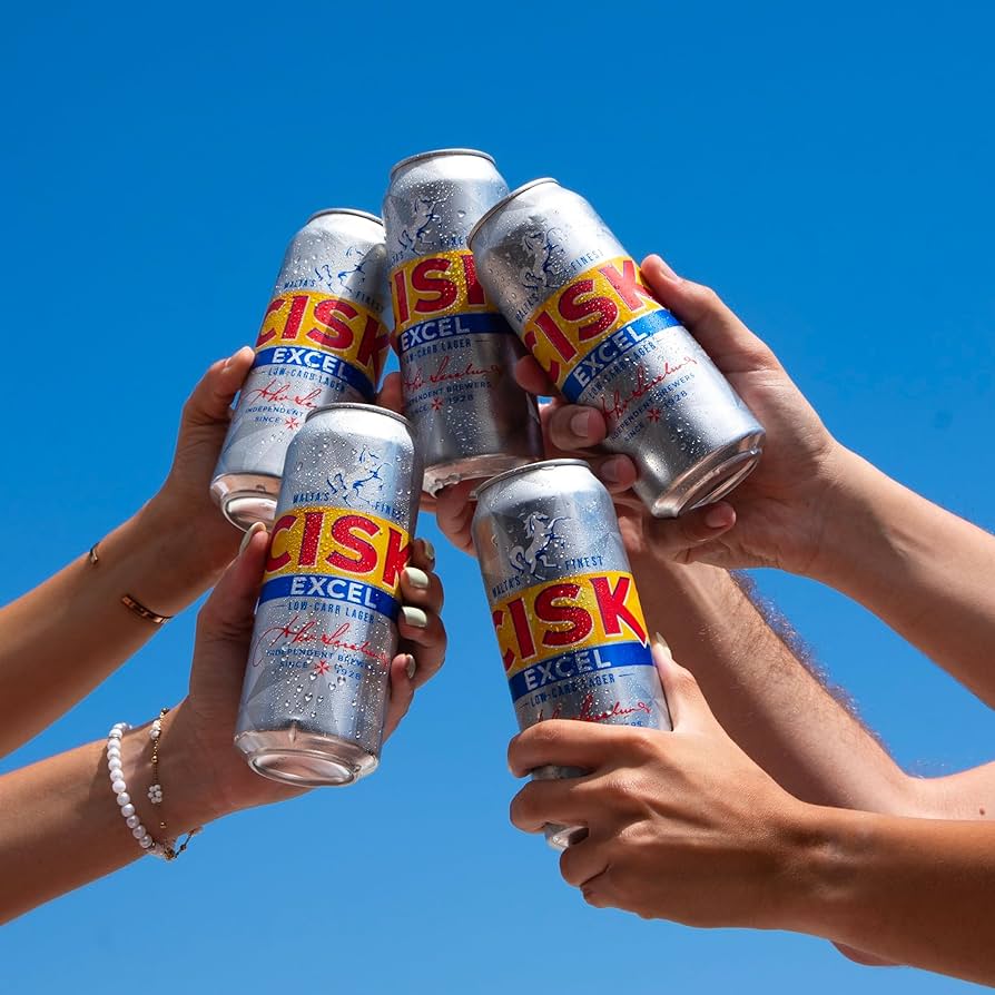 Promo shot for Cisk Excel, showing people clashing cans together in celebration