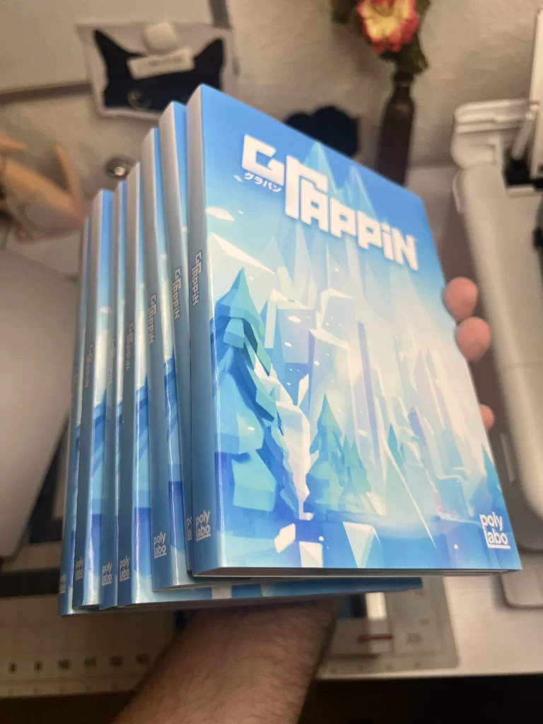 Putting indie games back on the shelf: Talking We The Indies with Chandler Kravitz 3 We The Indies - Grappin finished cases in hand